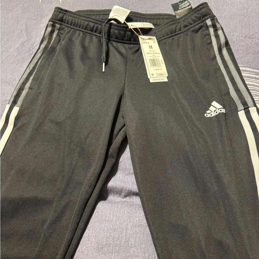 Adidas woman’s trio pants.